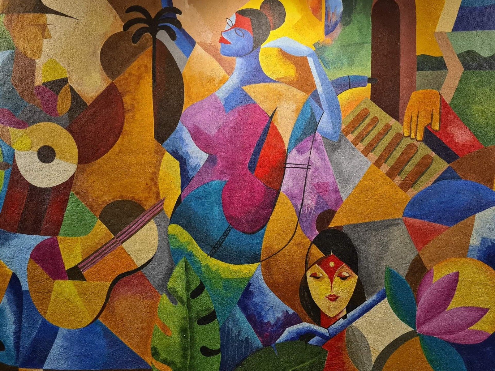 Cubist painting of musicians in warm colours
