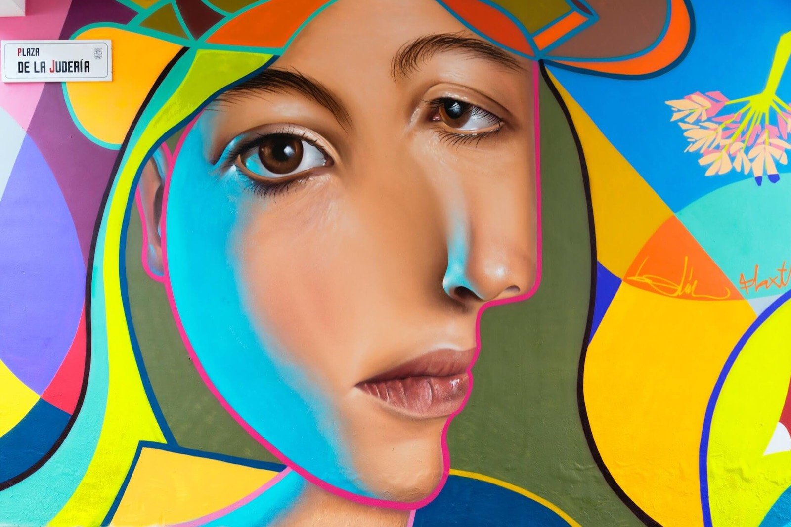 Colourful mural of a woman's face